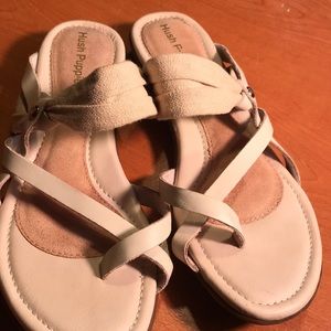 Women’s size 8 wrap toe tan slip on sandals.